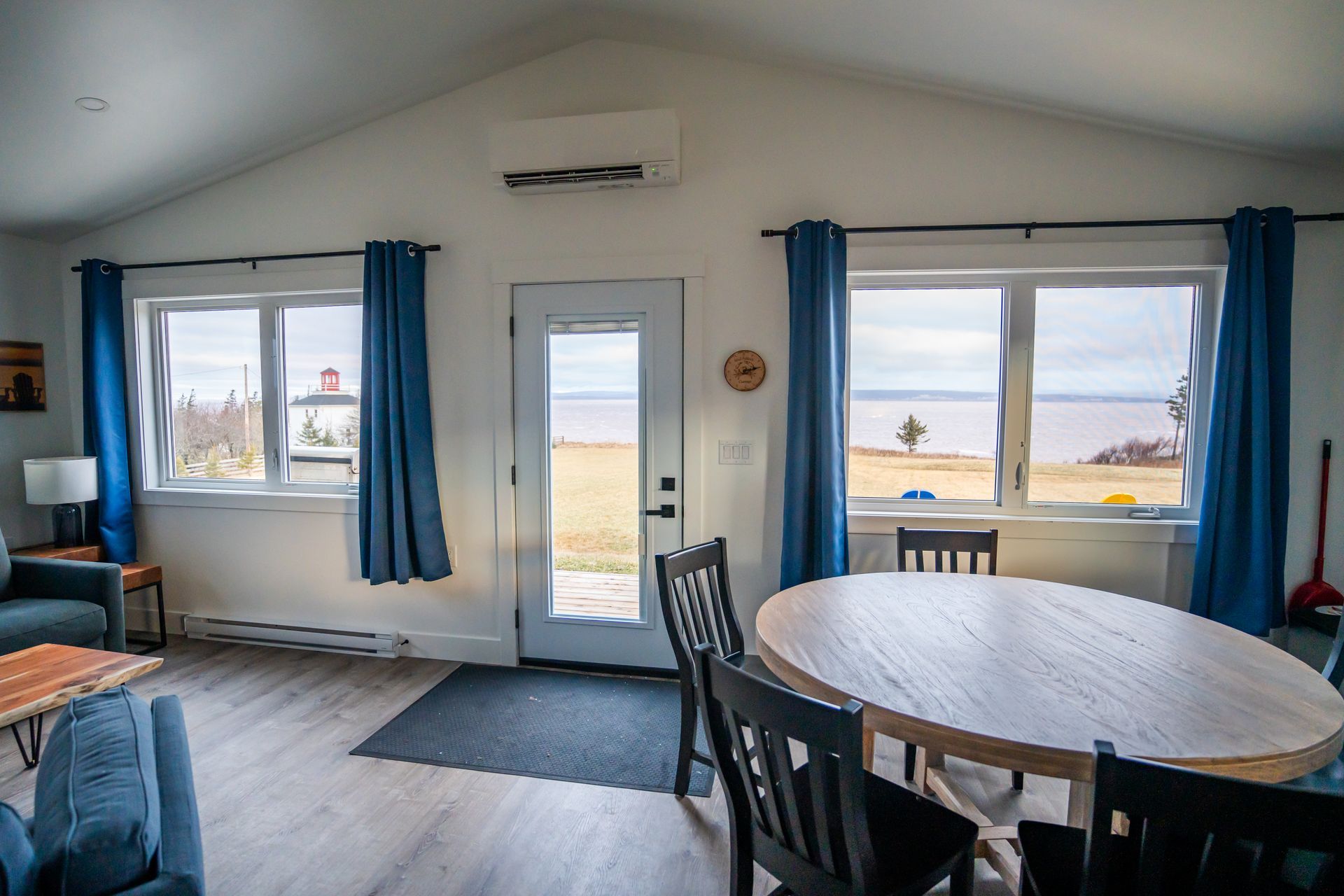 living area with windows over looking the bay of fundy