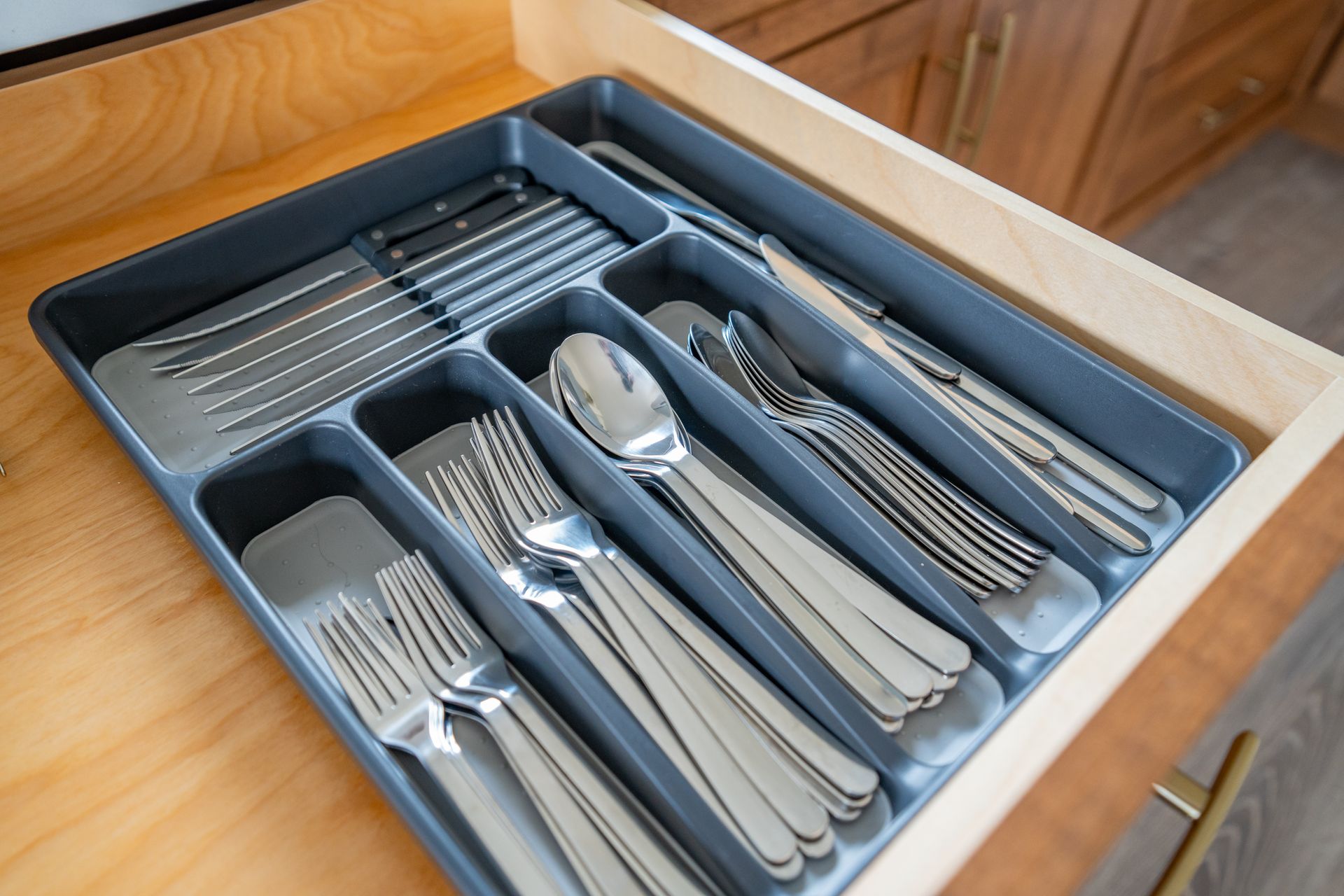 drawer full of cutlery 