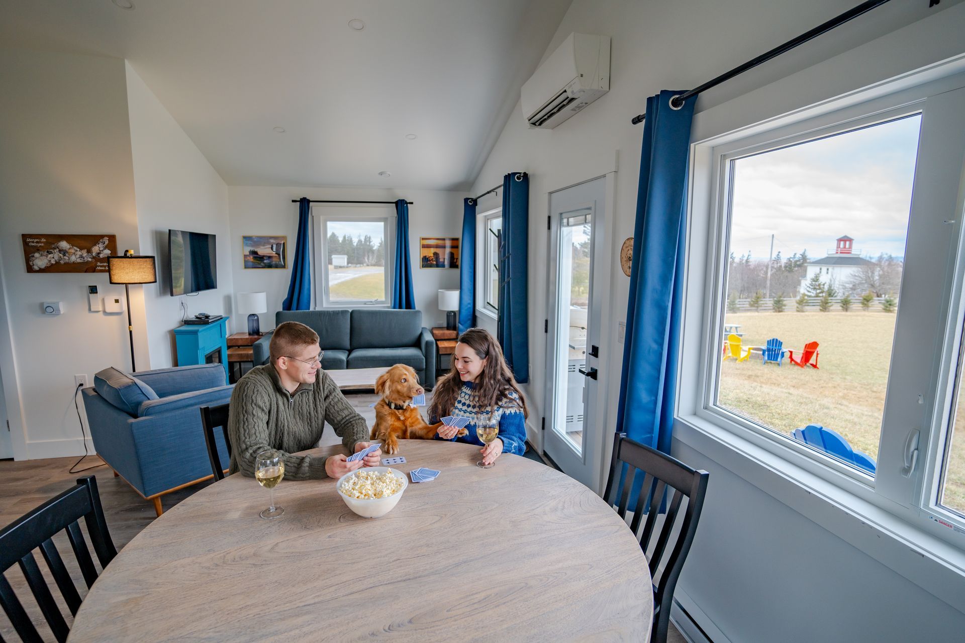 living area with windows over looking the bay of fundy