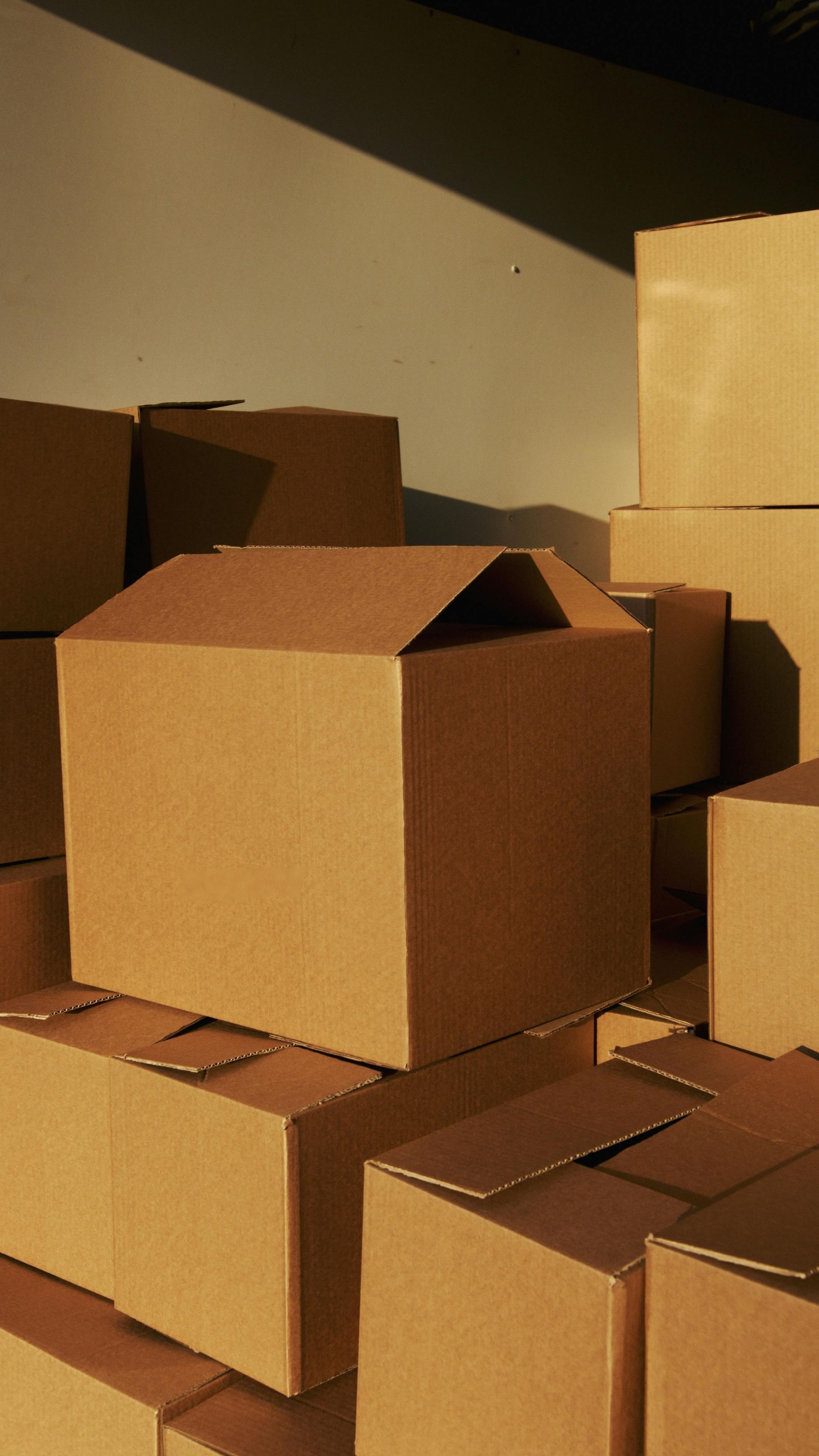 A pile of cardboard boxes stacked on top of each other