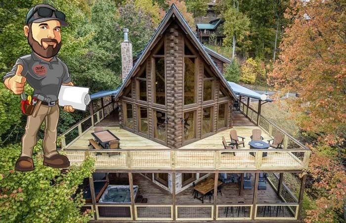 Cartoon handyman thumbs-up, holding paper, in front of cabin with decks, hot tub, and fall foliage.