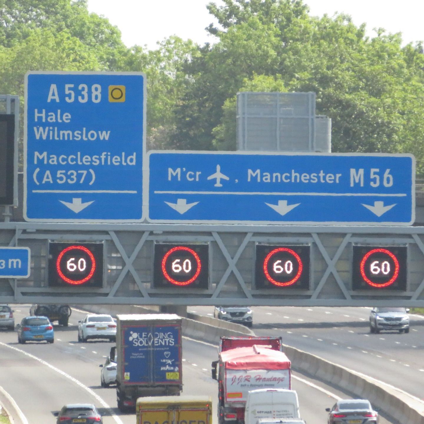 A highway with a sign that says manchester m56