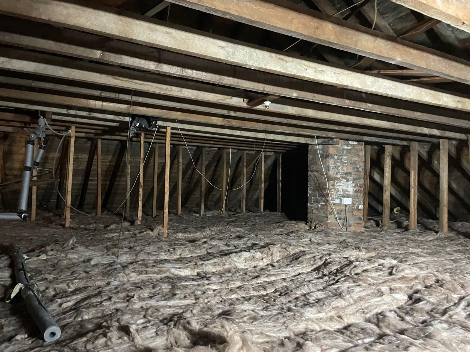 New Loft Insulation installed after damaged insulation was removed
