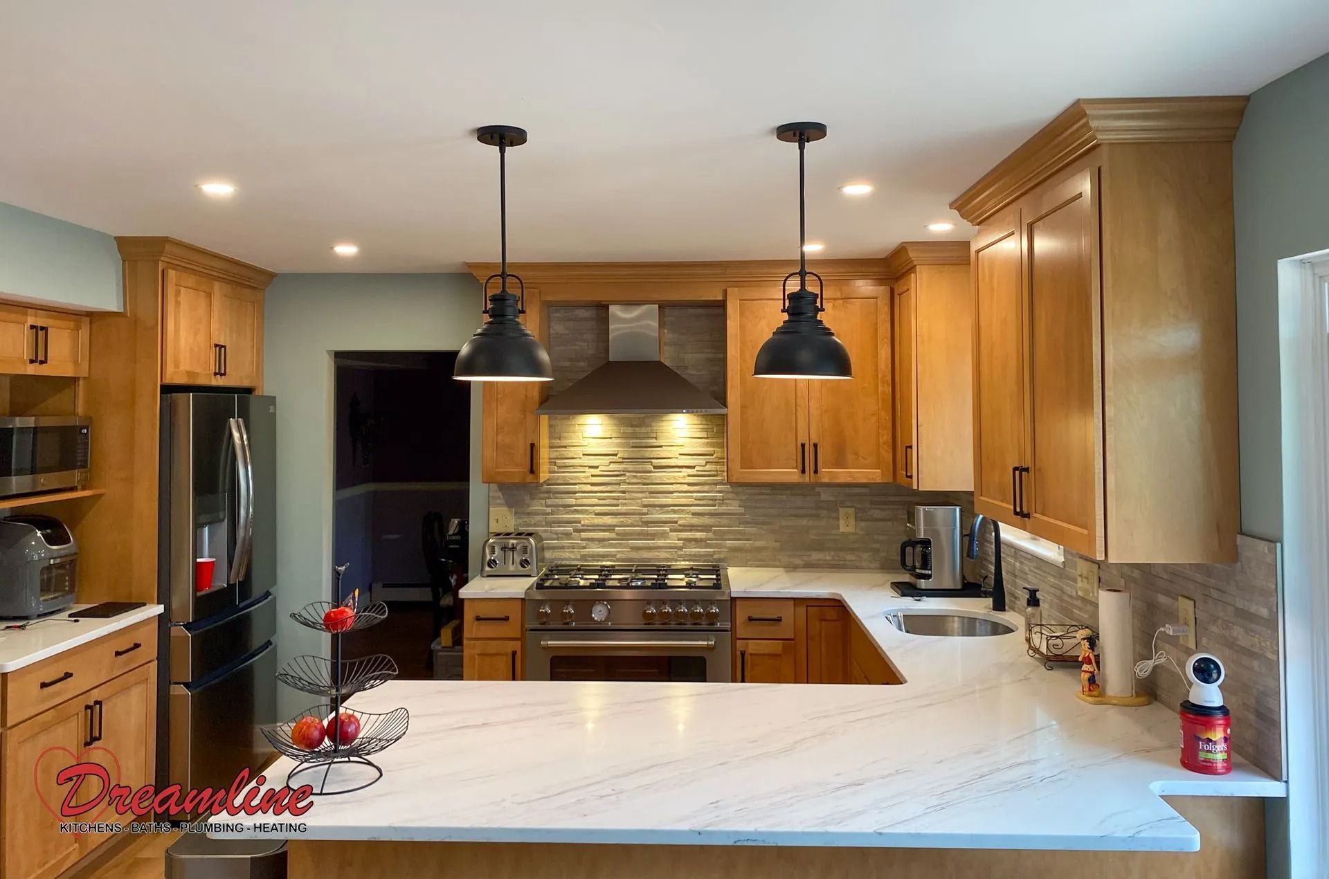 A kitchen with wooden cabinets and white counter tops