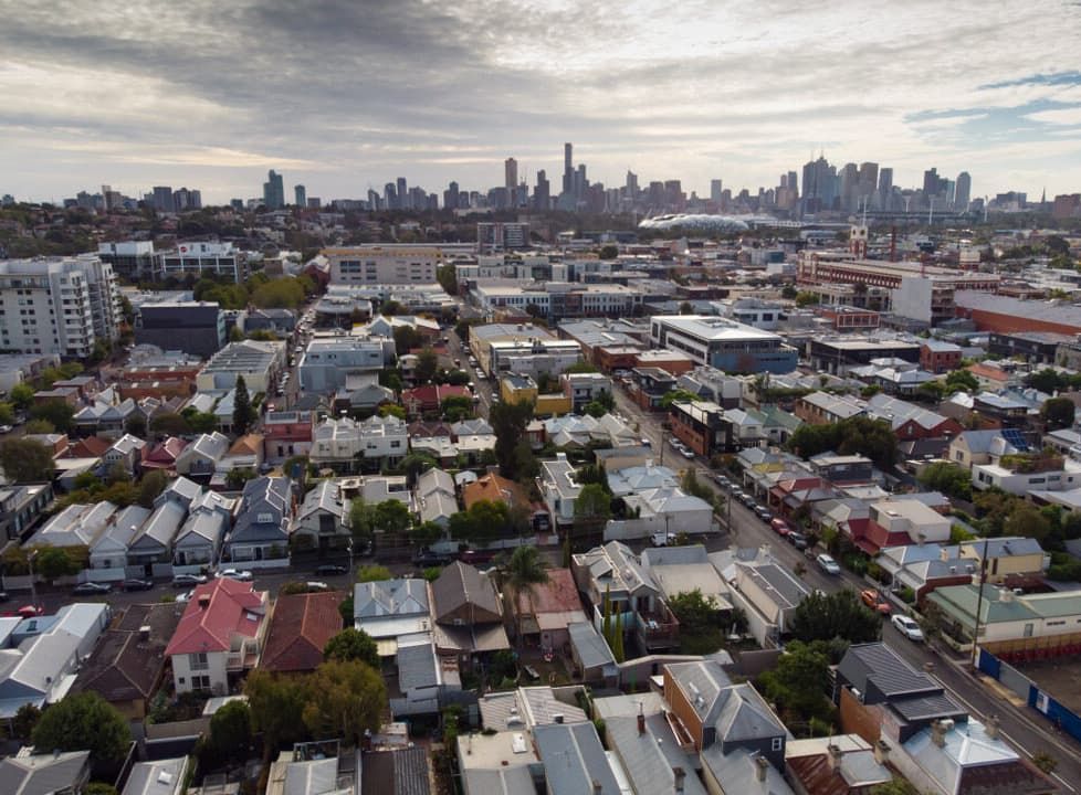 An Aerial View Of A Residential Area With A City Skyline In The Background — Point to Point Surveying In Yarrawonga, VIC