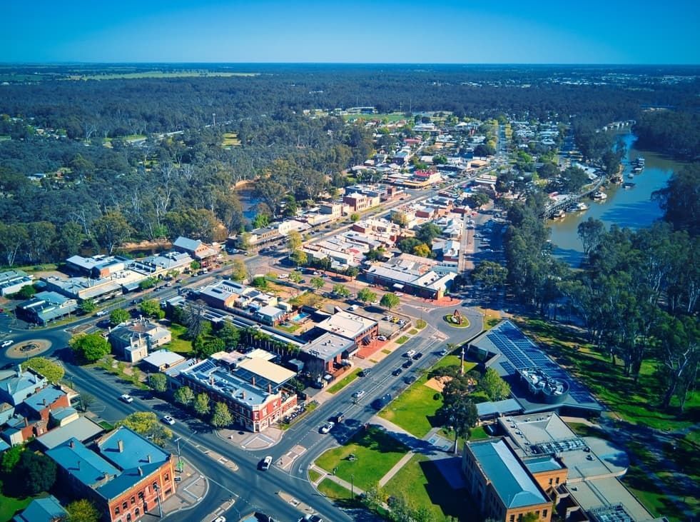 An Aerial View Of A Small Town With A River In The Background — Point to Point Surveying In Tatura, VIC