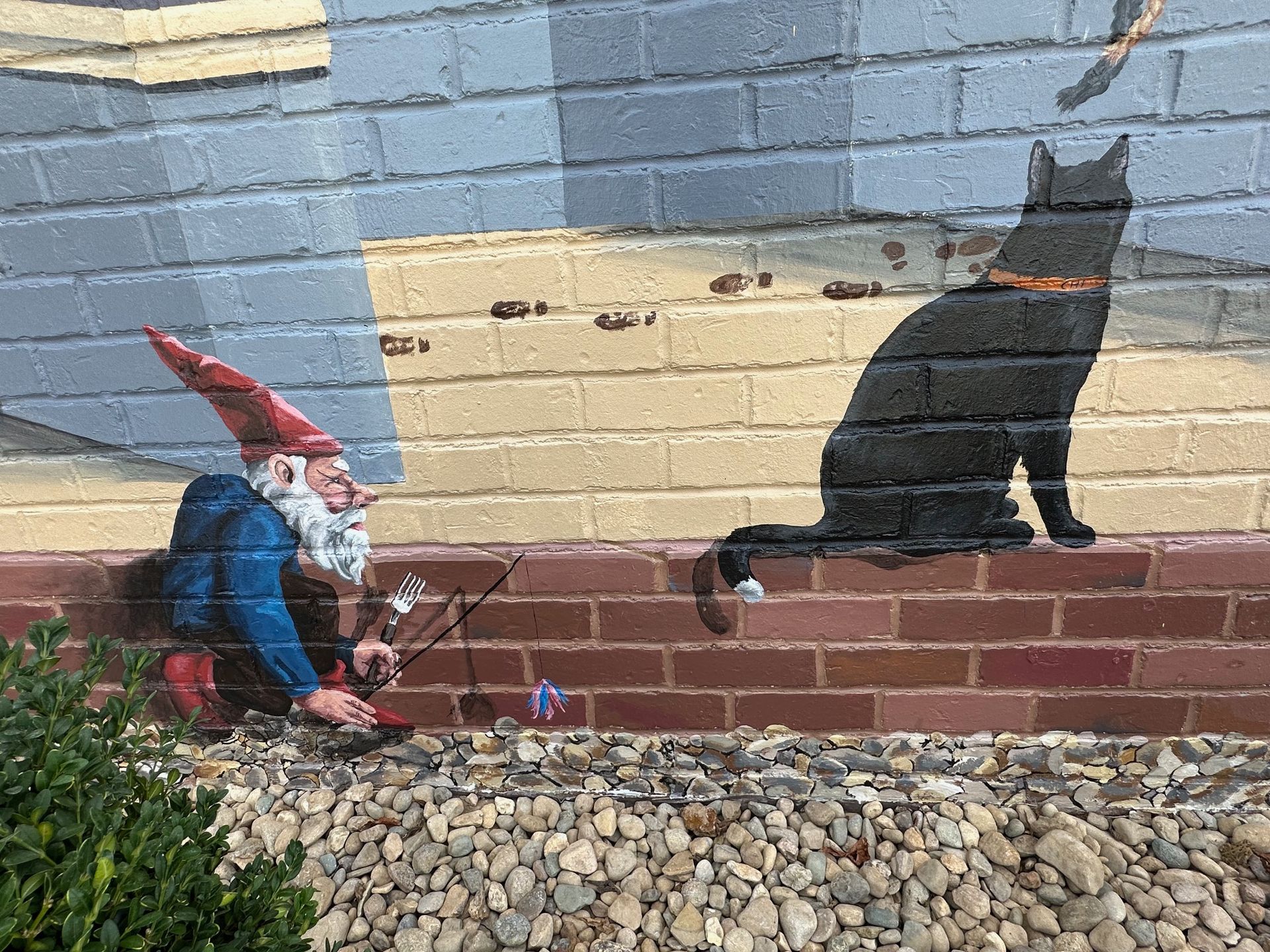 Gnome/Dwarf and Cat Close-up of Painting Characters in Her Books Painted on This Exterior Brick Wall - Exterior and Residential Mural Art
