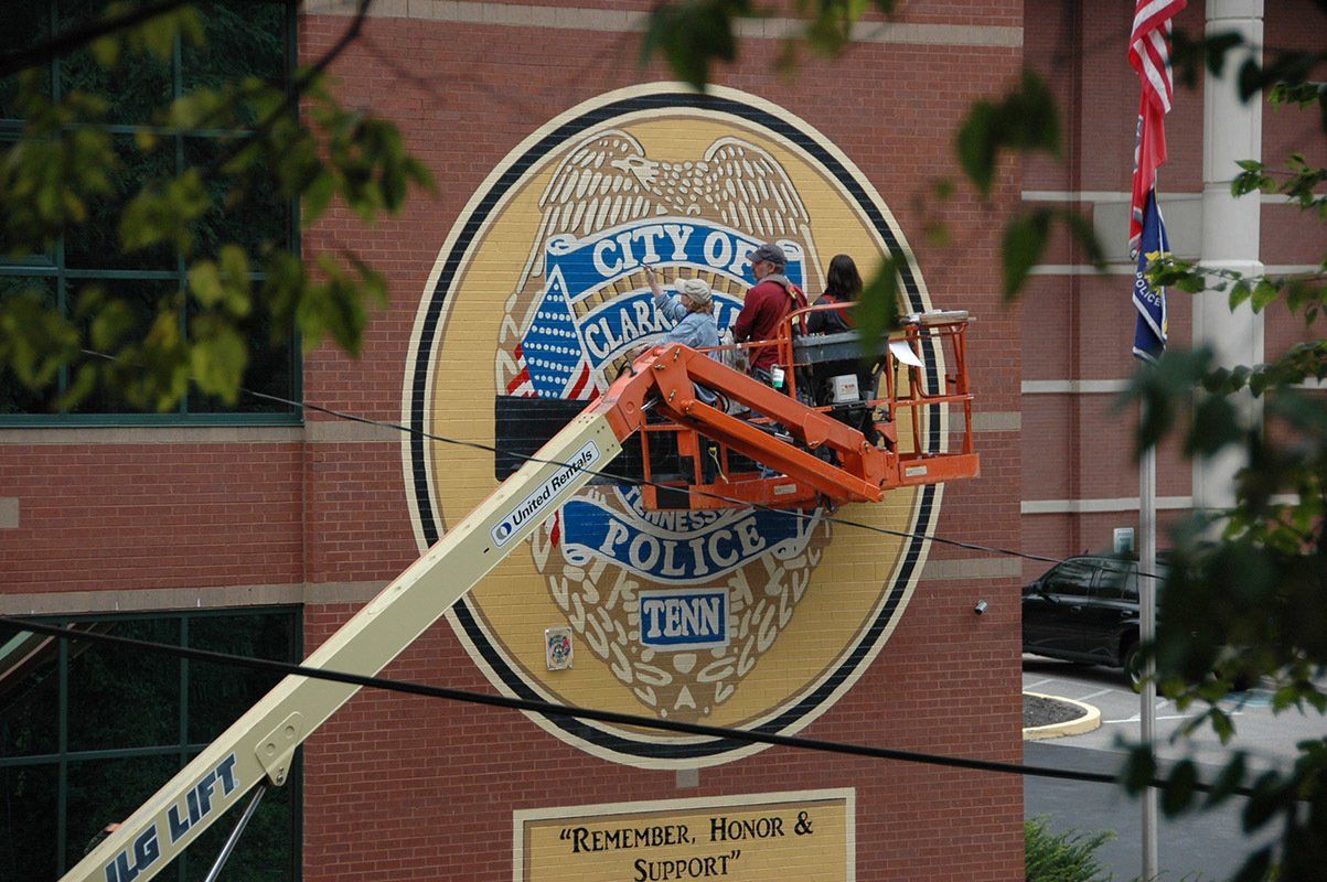 Amazing Exterior Mural In Clarksville TN Features Badge With Honor