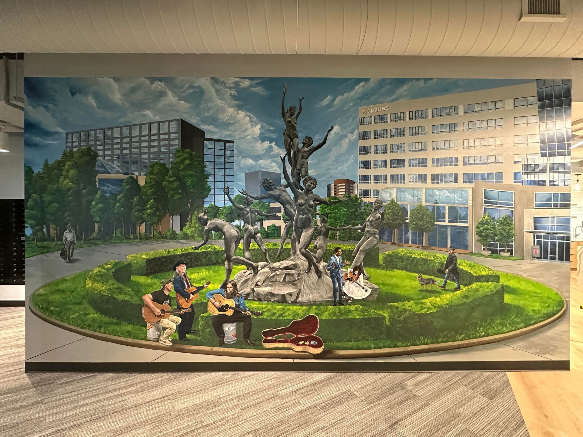 canvas painting of a fountain in a park with people sitting located at e|spaces in Nashville