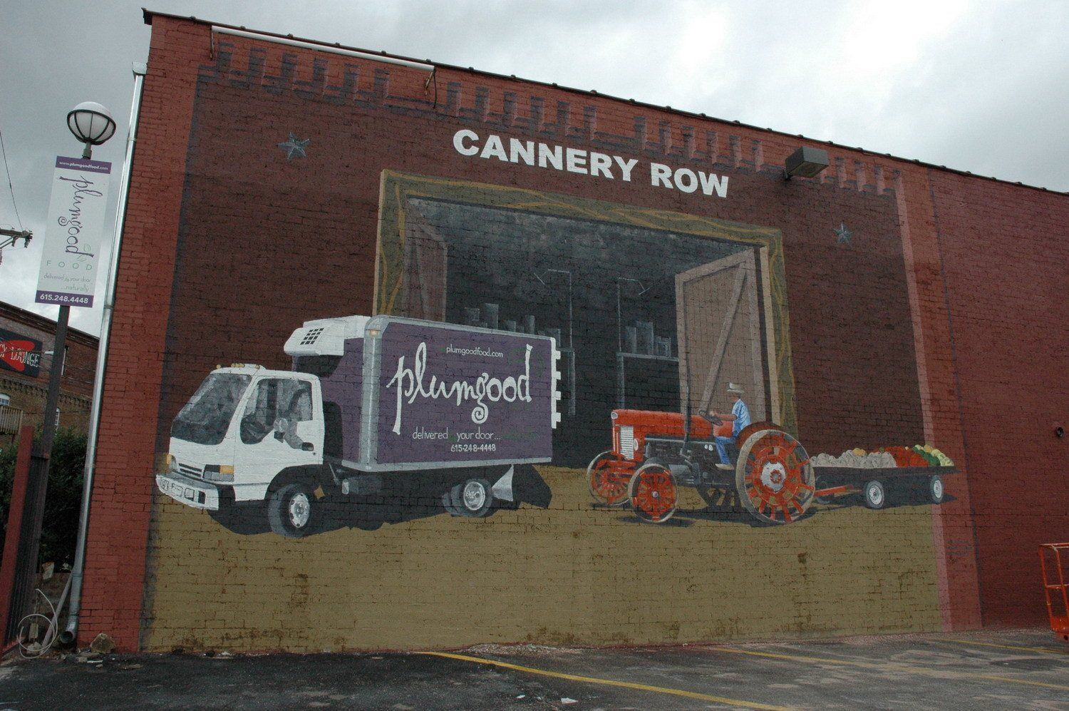 Mural Artist Paints Large-Scale Exterior for Plumgood Food in Nashville TN