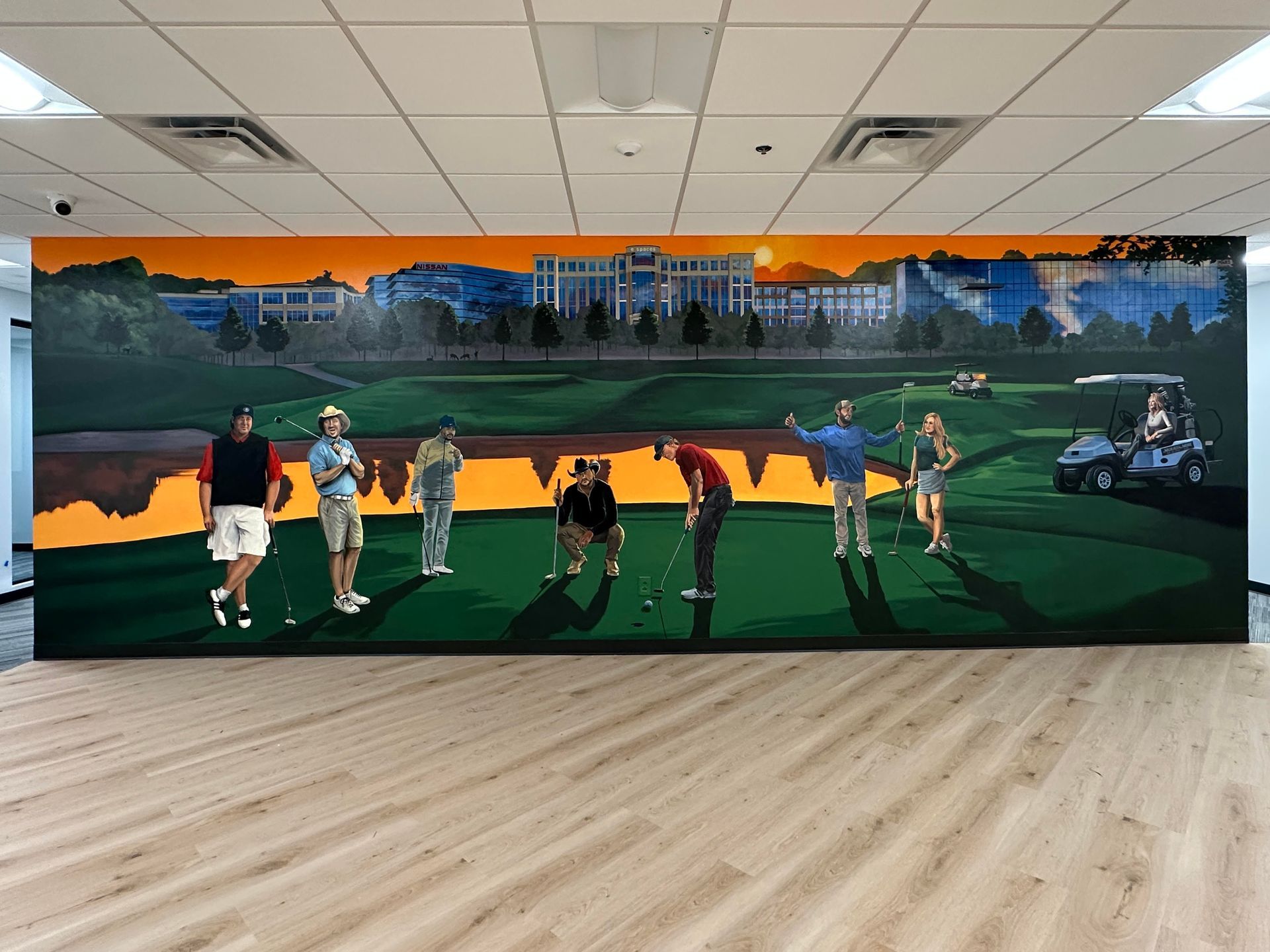 Mural of people playing golf on a green course, with a building and sunset backdrop.