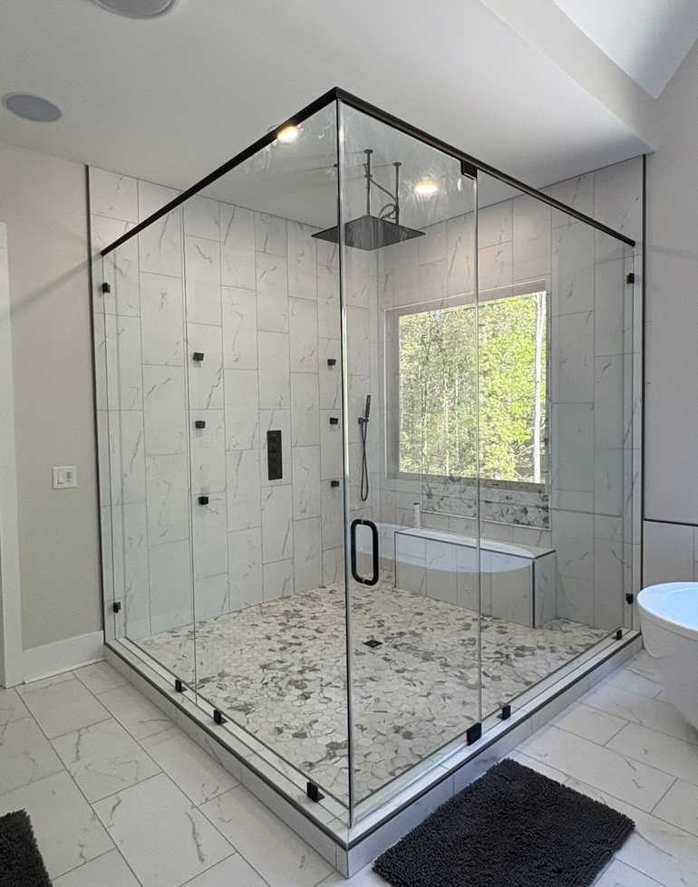 Glass shower enclosure 