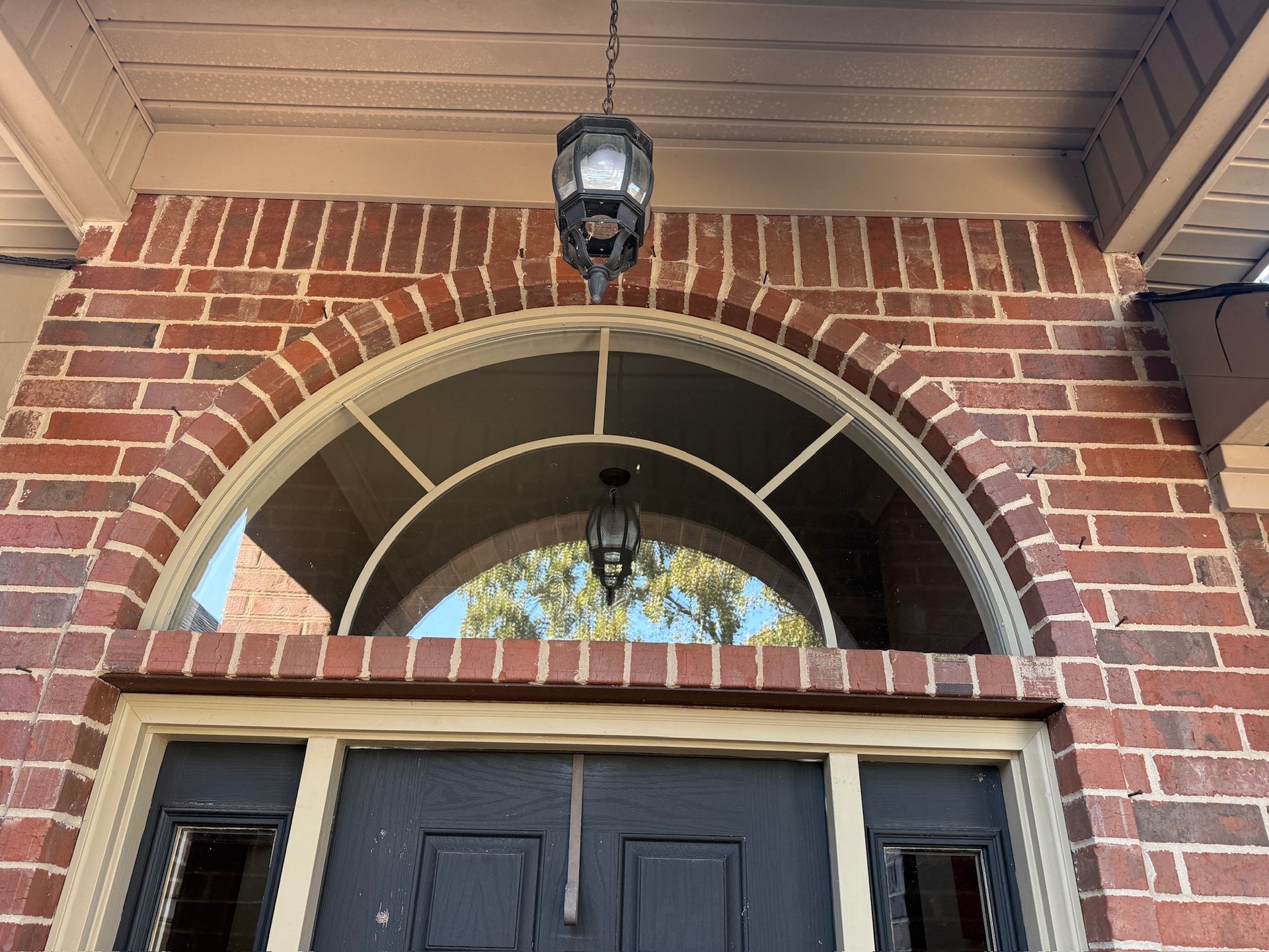 old window on a brick house