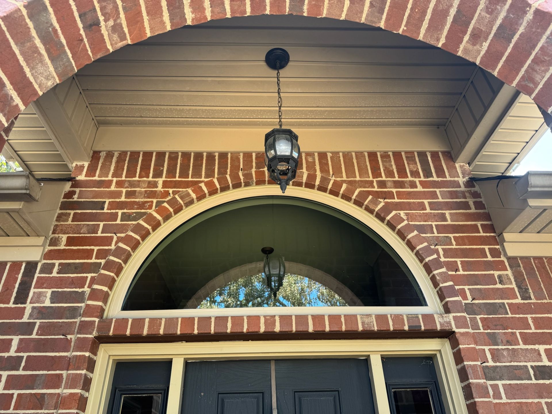 new window on the same brick house