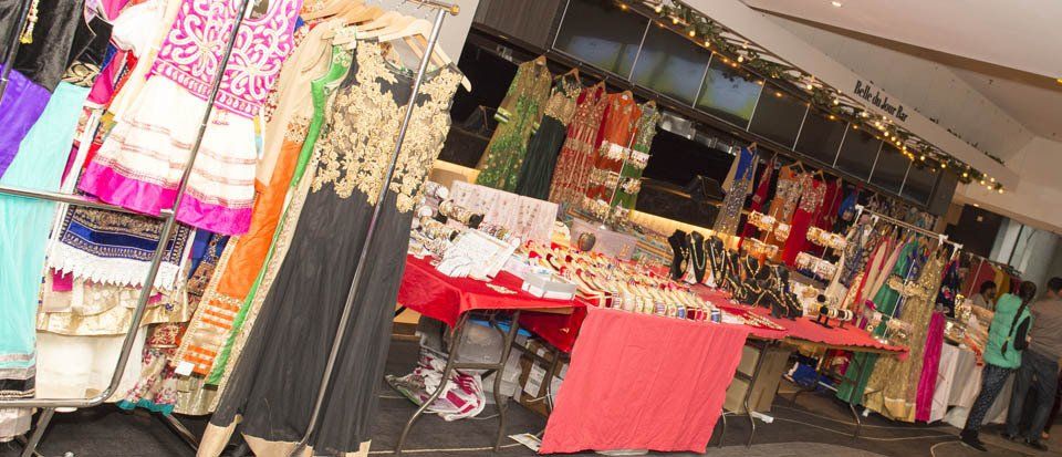 A store filled with lots of clothes and jewelry.