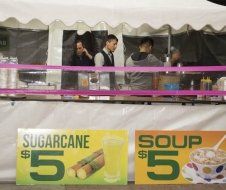 A sign that says sugarcane $ 5 and soup $ 5