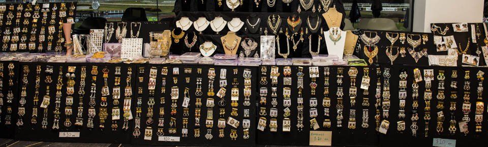 A jewelry store with a lot of jewelry on display.