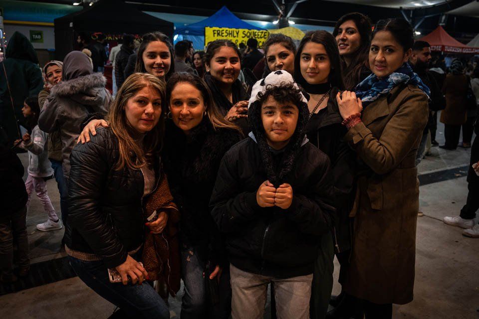 A group of people are posing for a picture together.