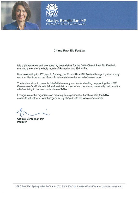 A letter with a picture of a woman and a signature on it.