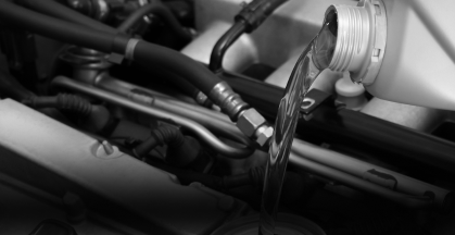 Oil Change for vehicle under hood | DeMartile Auto Care & Tires