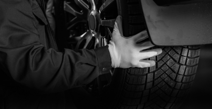 Technician performing Tire Service | DeMartile Auto Care & Tires