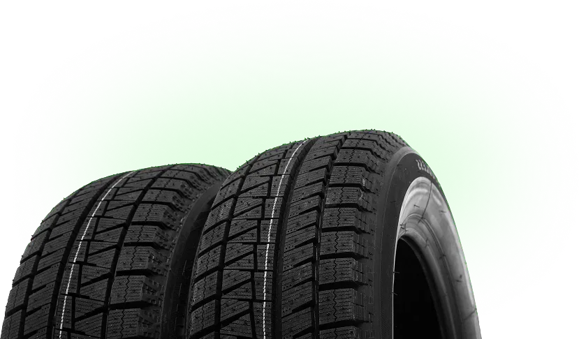 Tires with green glow in background | DeMartile Auto Care & Tires