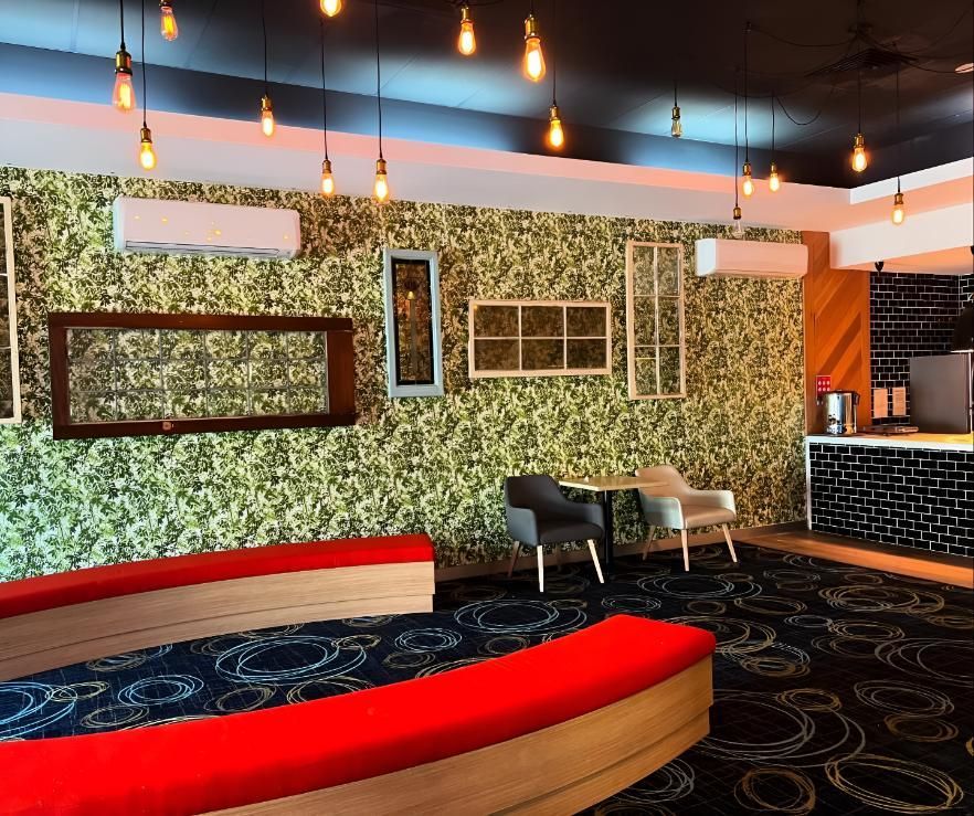 Room With a Table and Chairs in It — Kiama Air Conditioning in Albion Park Rail, NSW