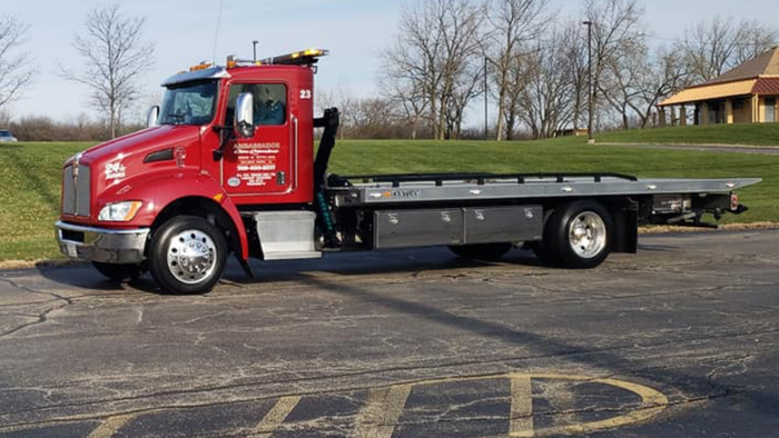 Red Towing Truck — Orland Park, IL — Ambassador Car Carriers Inc. Est.