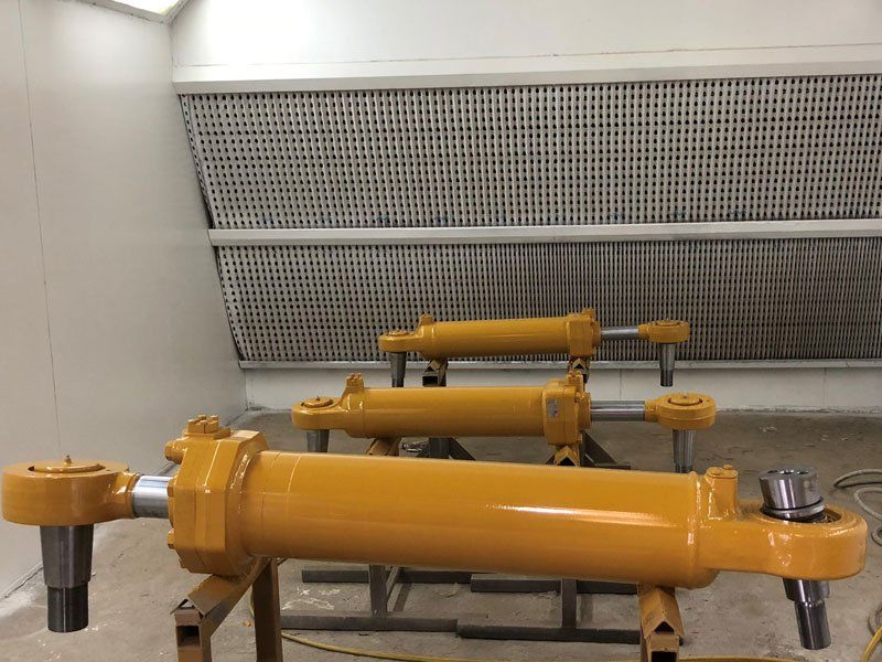 Orange Steer Cylinder — Powder coating service in Tomago, NSW