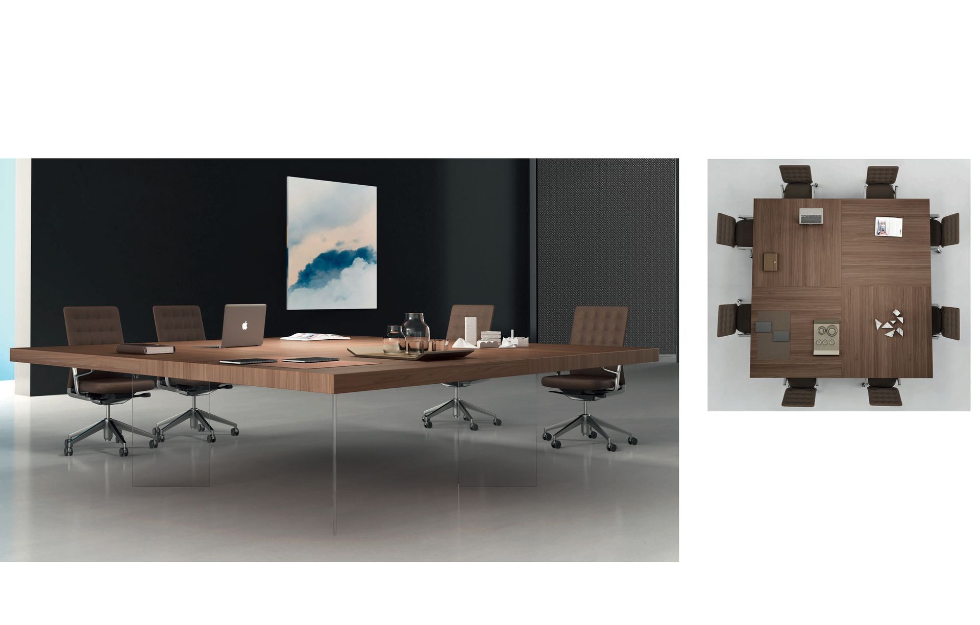 Sala conferenze con grande tavolo in legno, sedie e opere d'arte. È presente anche una vista dall'alto.