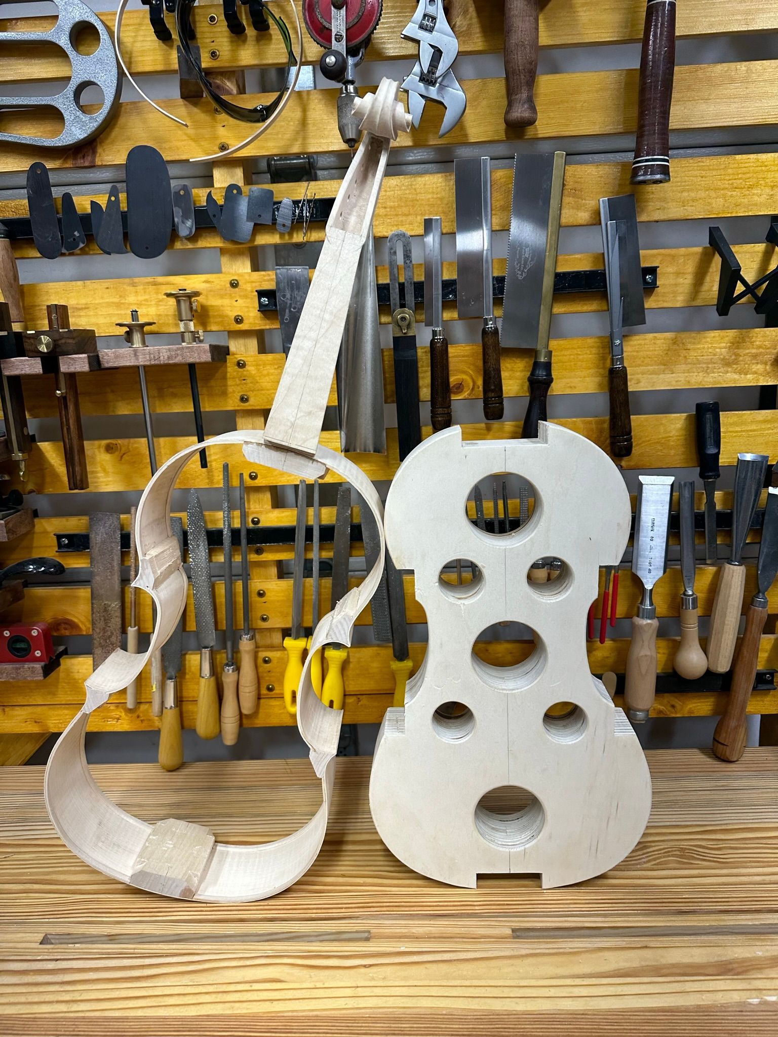A piece of wood is sitting on top of a table saw
