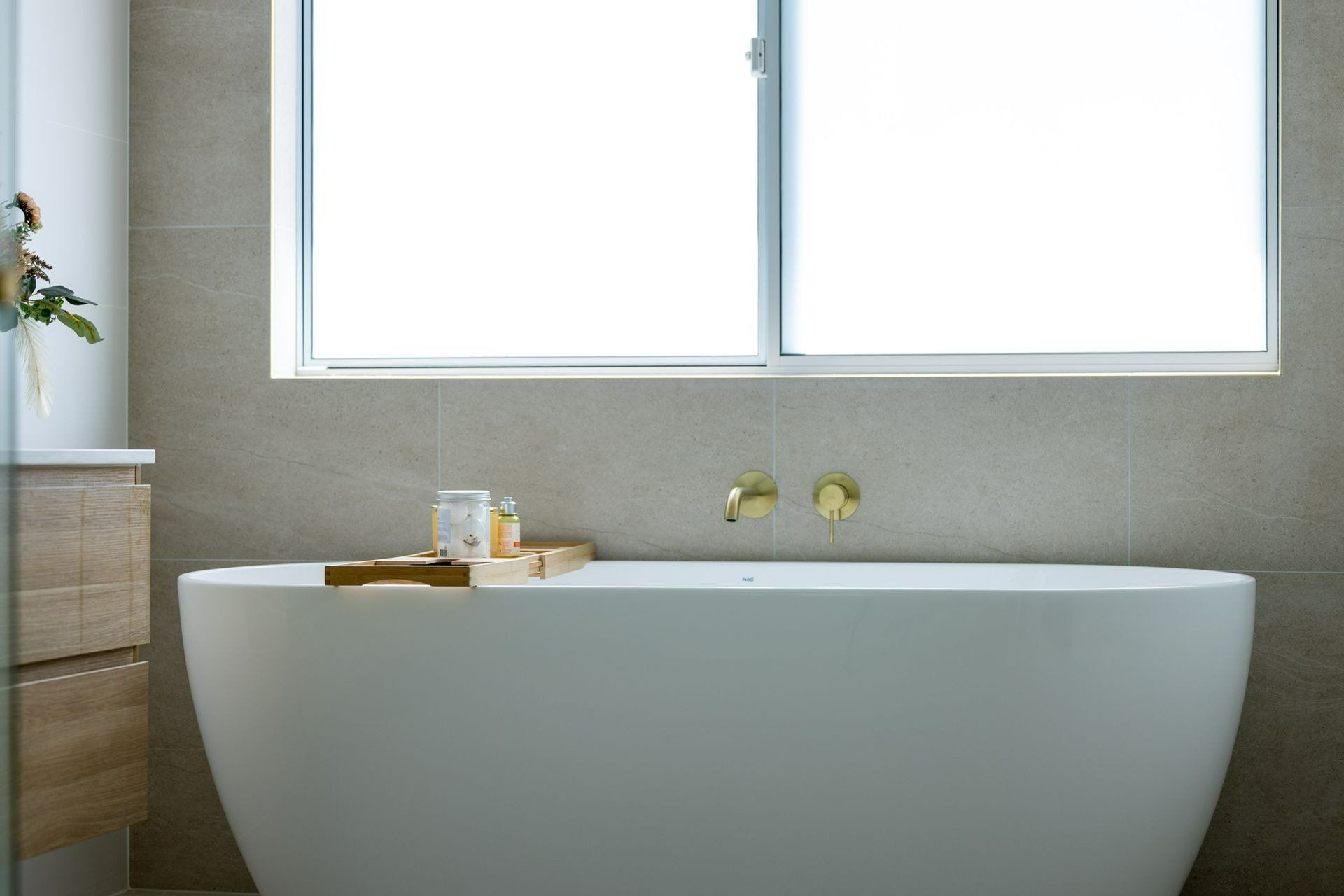 a bathroom with a large bathtub — Blue Horizon Projects in Bateau Bay, NSW