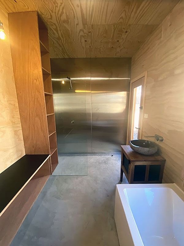 A Bathroom with A Sink and A Bathtub and A Walk in Shower — Blue Horizon Projects in Bateau Bay, NSW