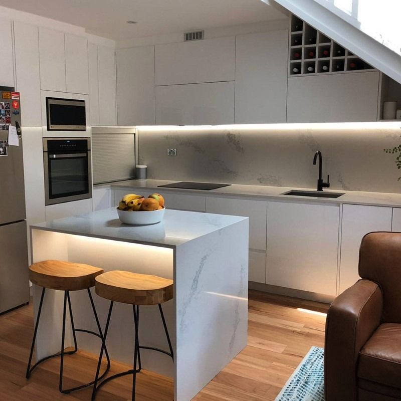 A Kitchen with A Bowl of Fruit on The Counter — Blue Horizon Projects in Bateau Bay, NSW
