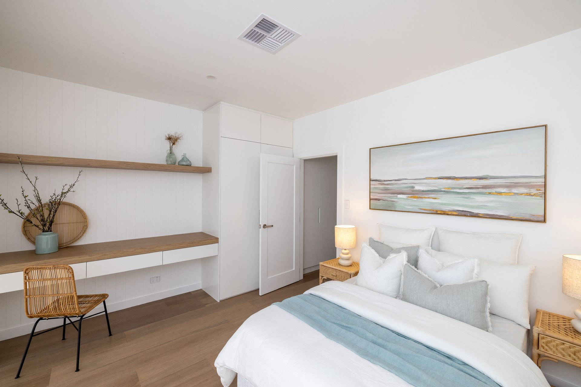 A bedroom with a nice bed and pillows — Blue Horizon Projects in Bateau Bay, NSW