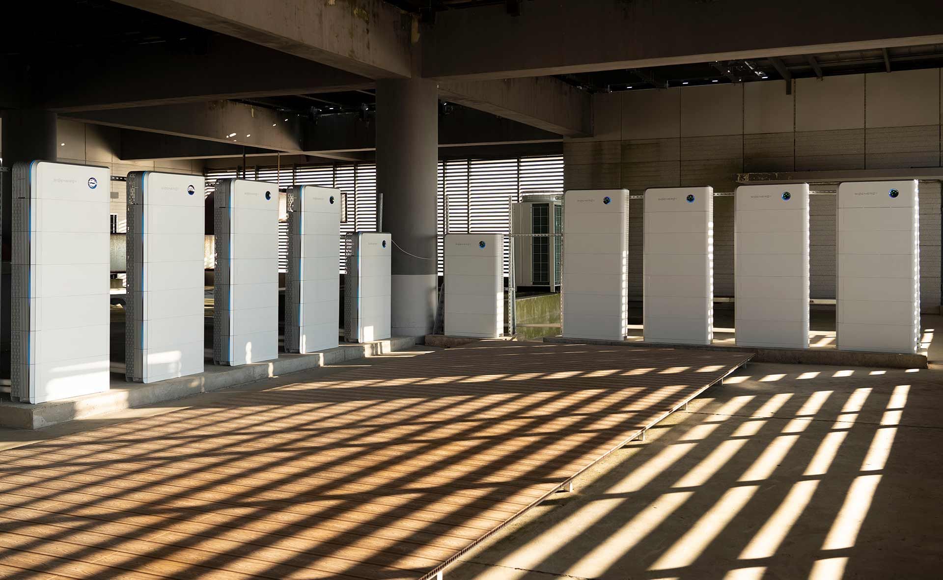 A Row Of Large Solar Batteries — Des Mullins Electrical & Solar In Wagga Wagga, NSW