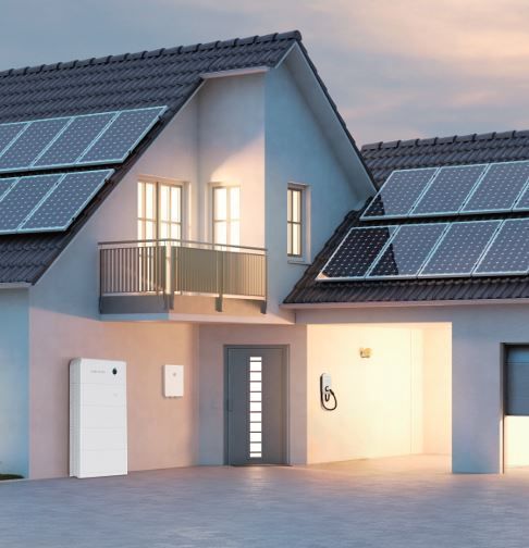 A House With A Balcony And Solar Panels On The Roof — Des Mullins Electrical & Solar In Wagga Wagga, NSW
