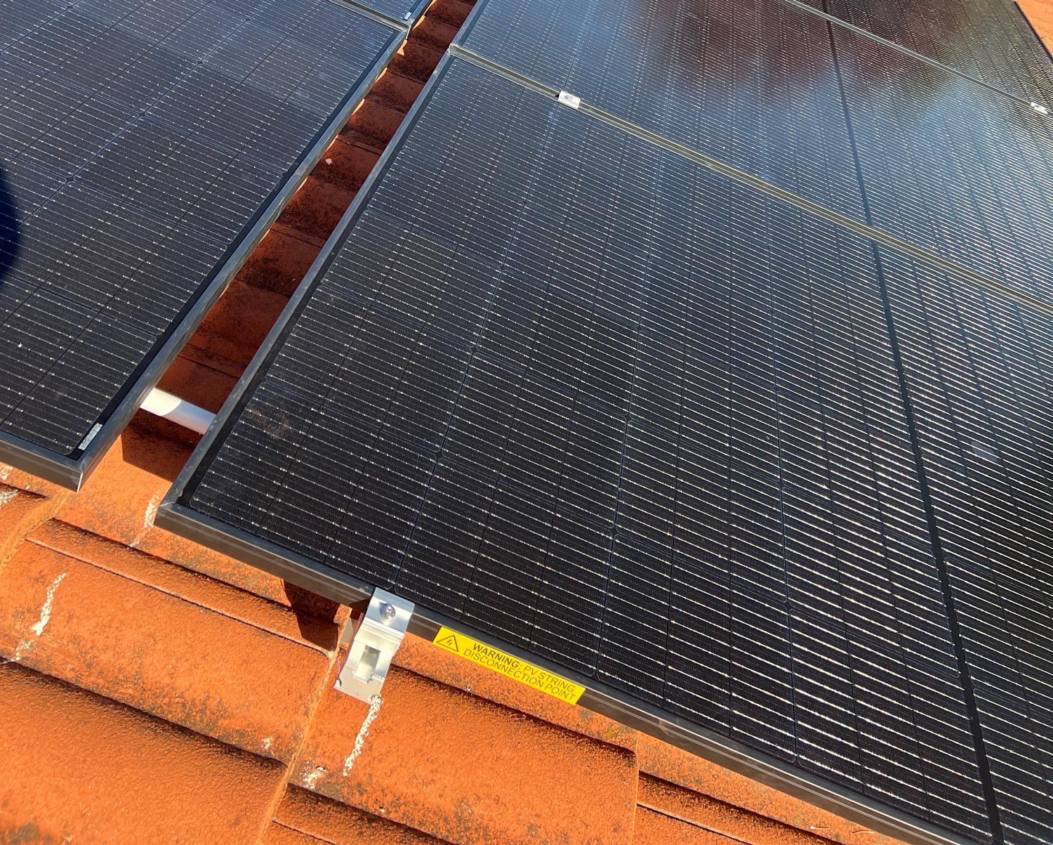 Solar Panels Carefully Installed On The Roof