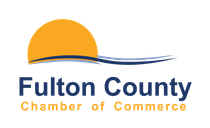 Logo for Fulton County Chamber of Commerce featuring a yellow semi-circle over blue swooshes above the organization name.