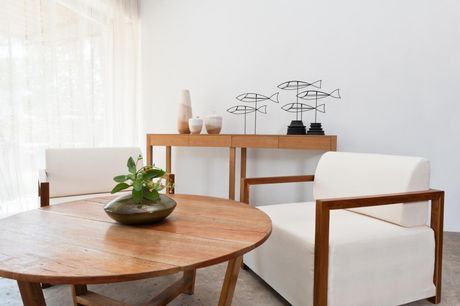 wood table and white single couch