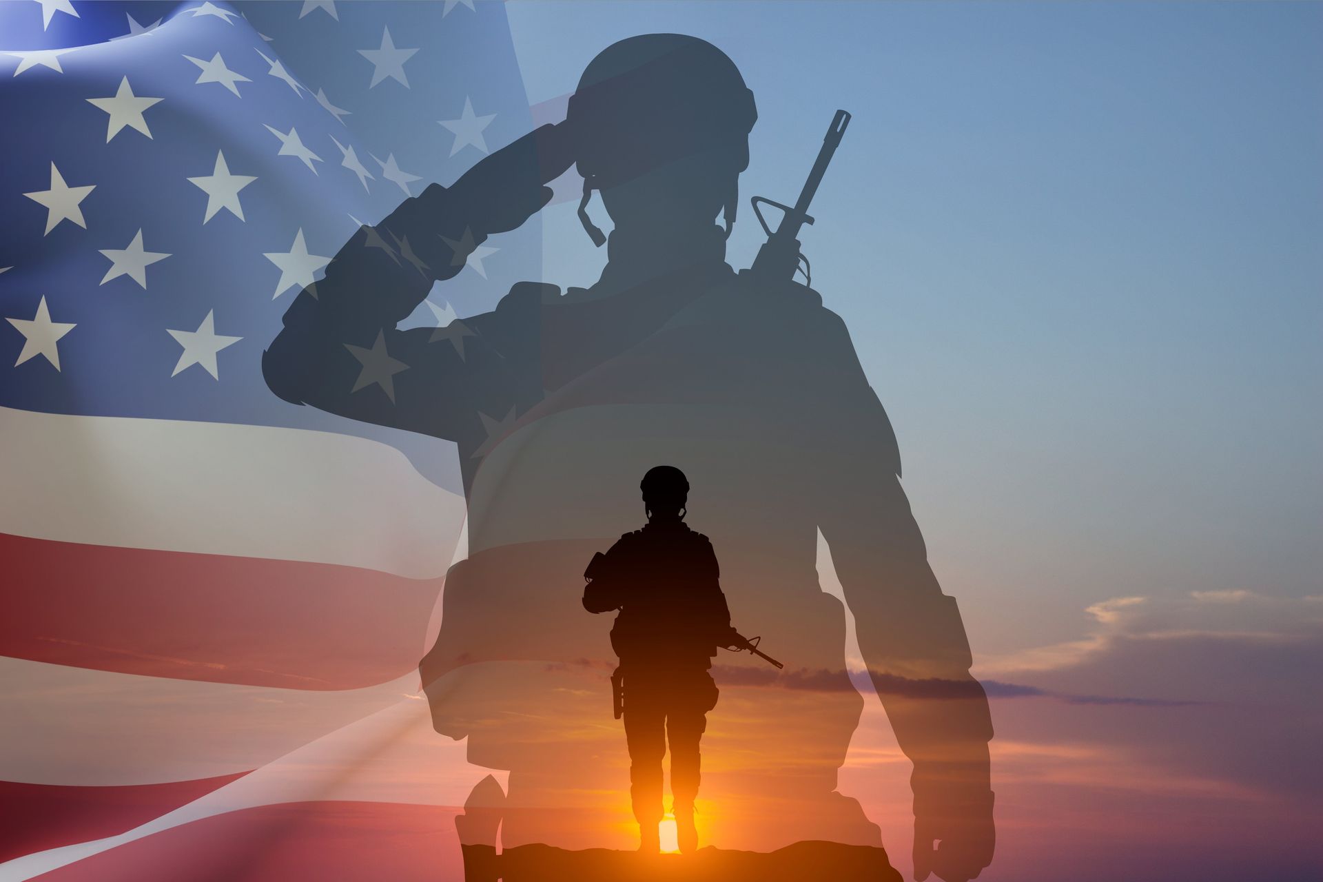 Soldier silhouette at sunset over an American flag backdrop