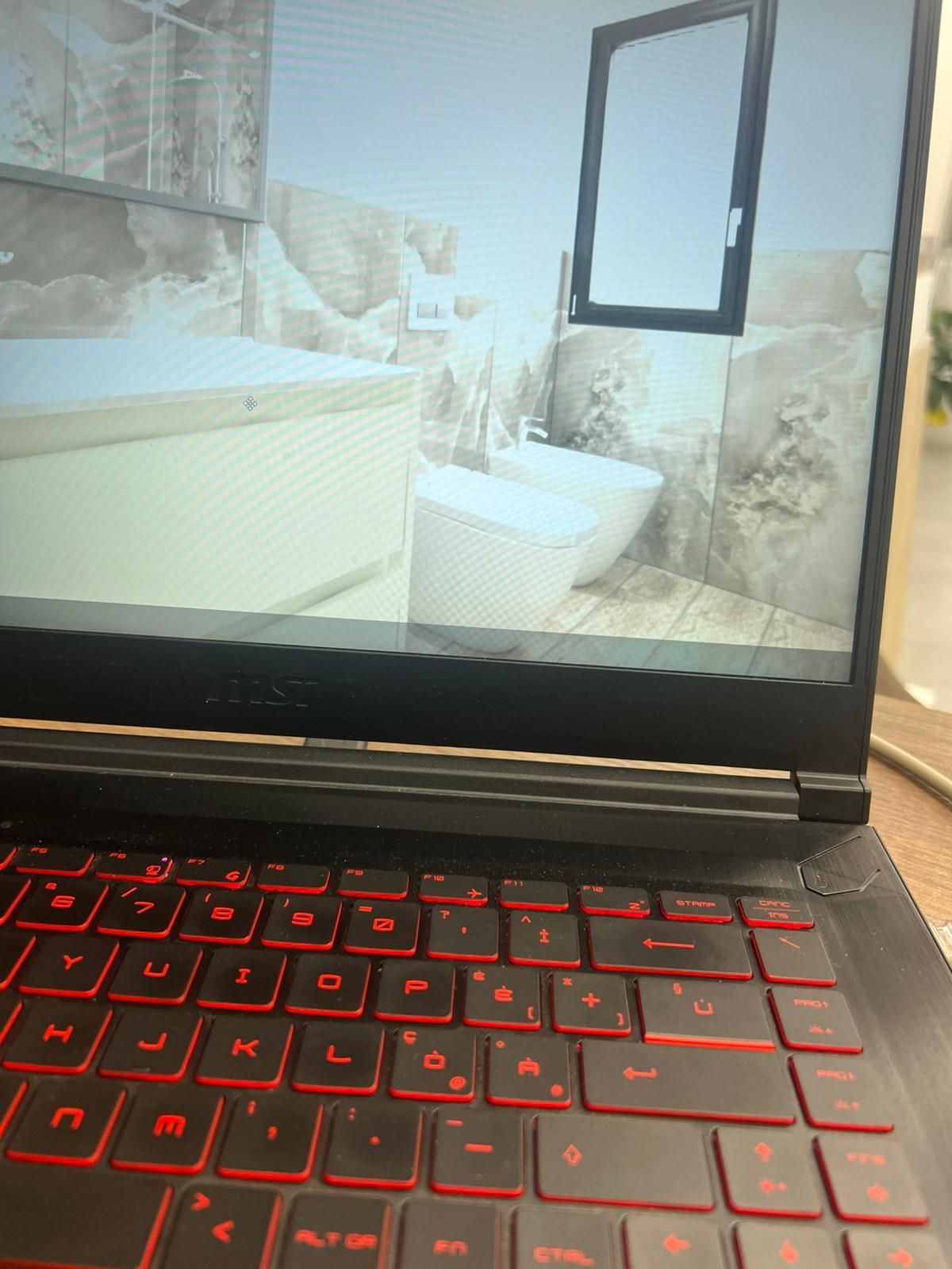 Un computer portatile con l'immagine di un bagno sullo schermo.