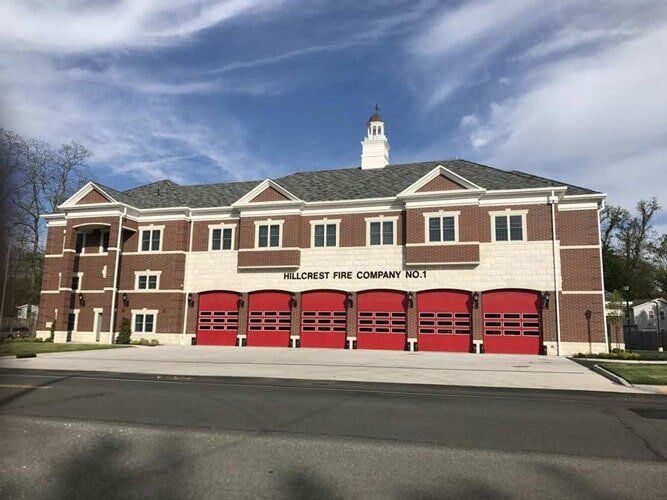 Red Garage Door — Hillburn, NY — Tri-State Commercial Roofing Corp