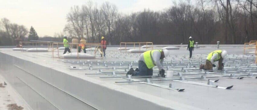 Workers On Rooftop — Hillburn, NY — Tri-State Commercial Roofing Corp