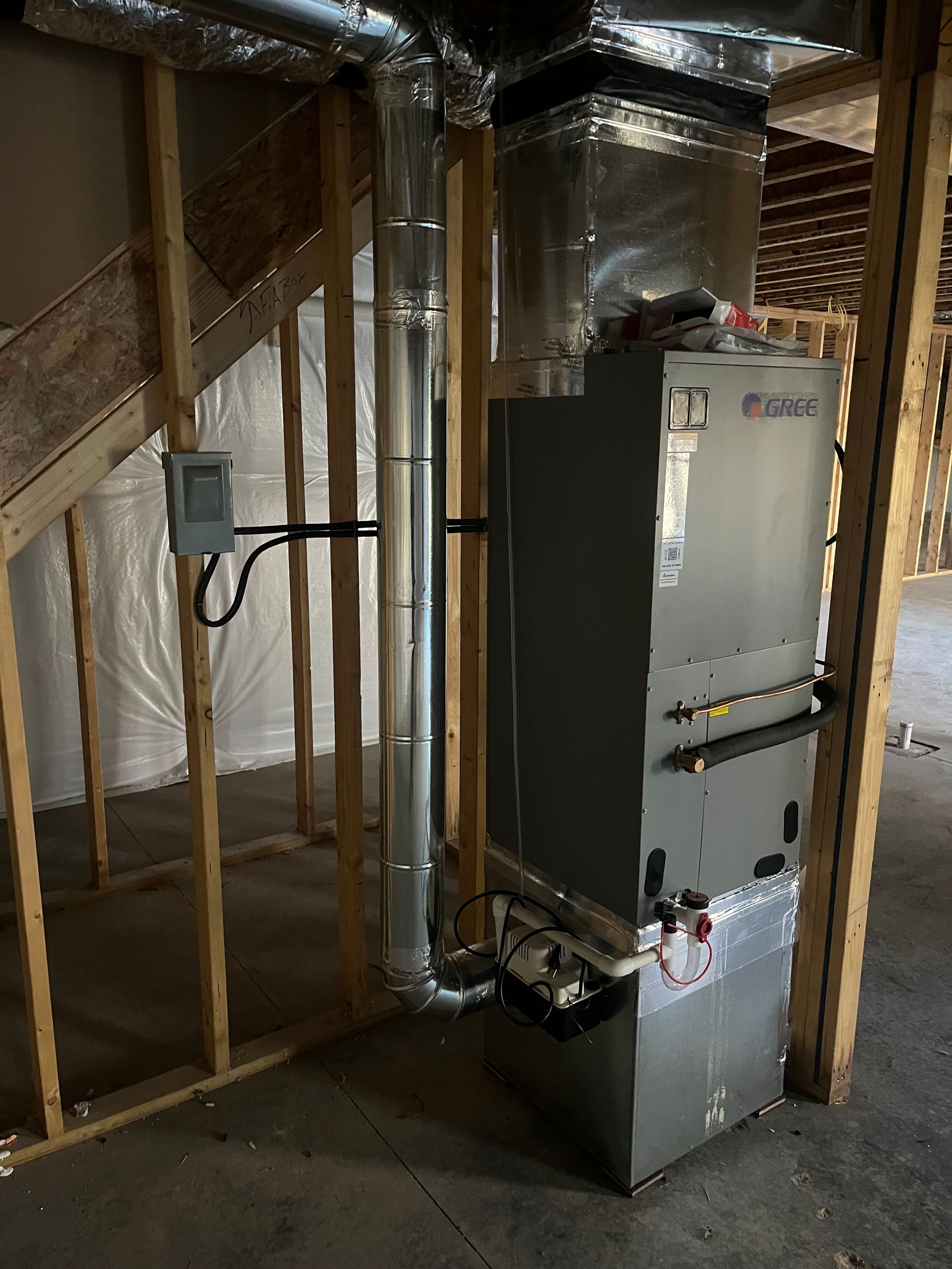 a heating and cooling system is installed in a room under construction .