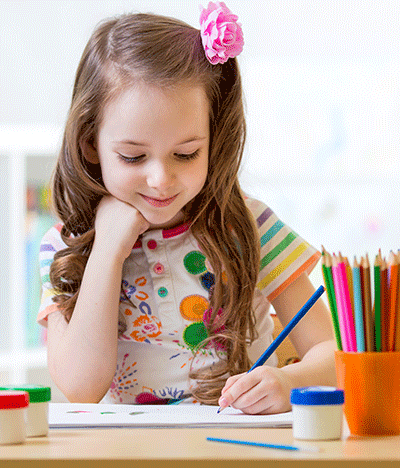 young girl coloring