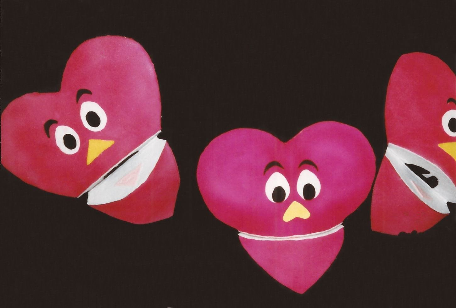 three blacklight foam heart puppets