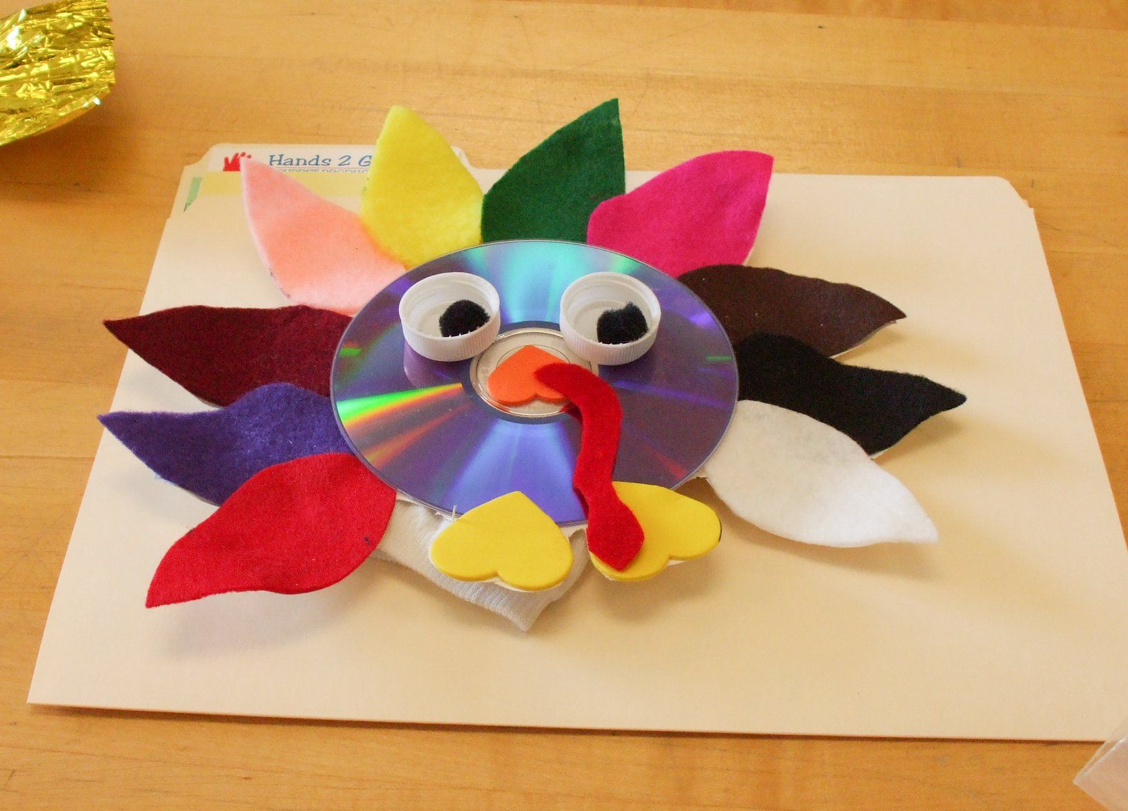 fun and colorful turkey puppet created at our workshop
