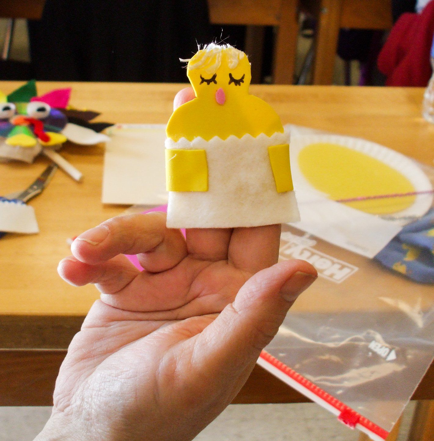 yellow chick finger puppet created by our workshop participant