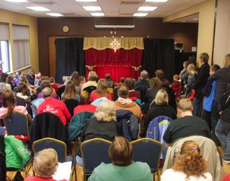 View of marionette stage from back of audience